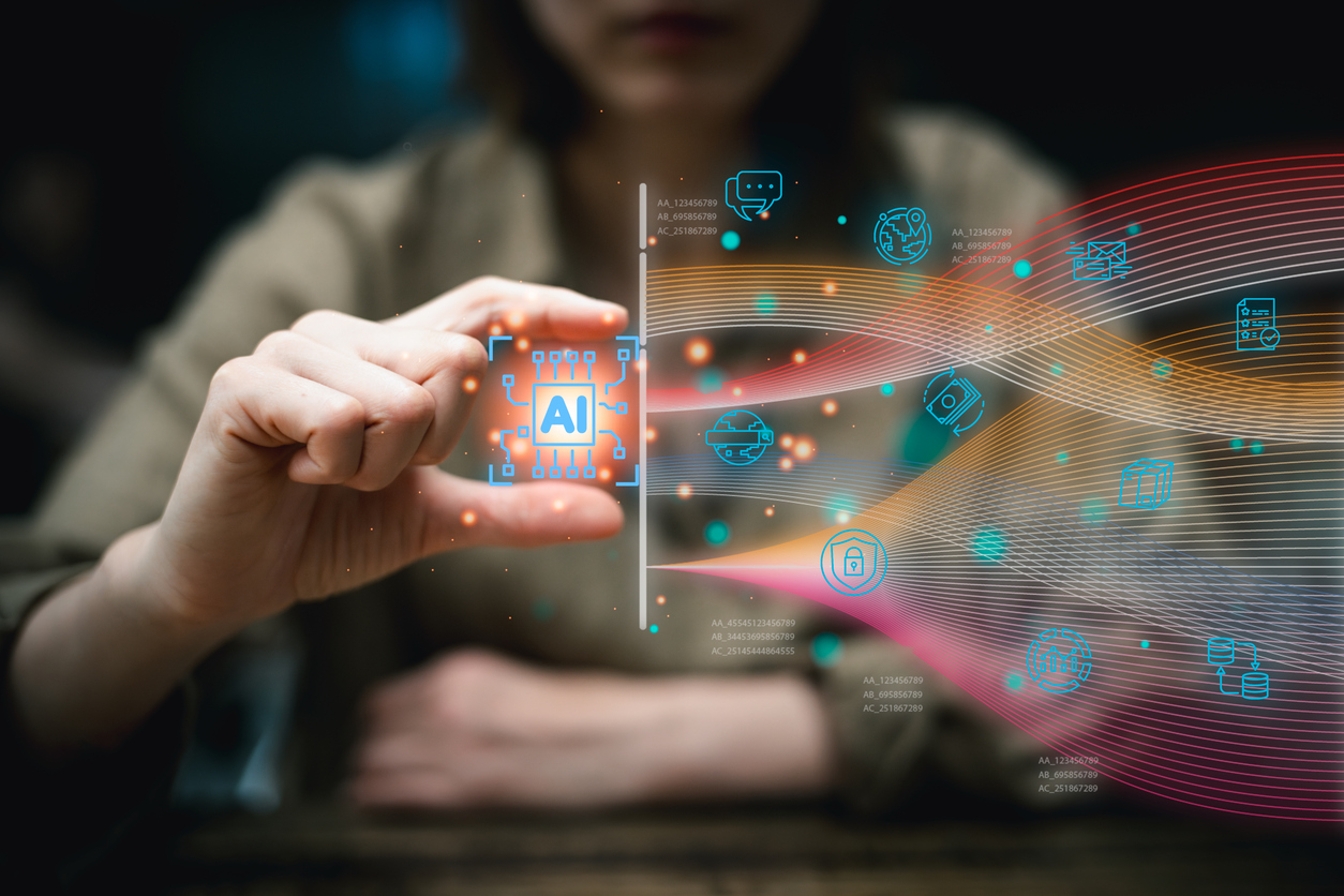 Person holding an AI chip with data streams flowing in, representing AI-ready data and an AI readiness assessment